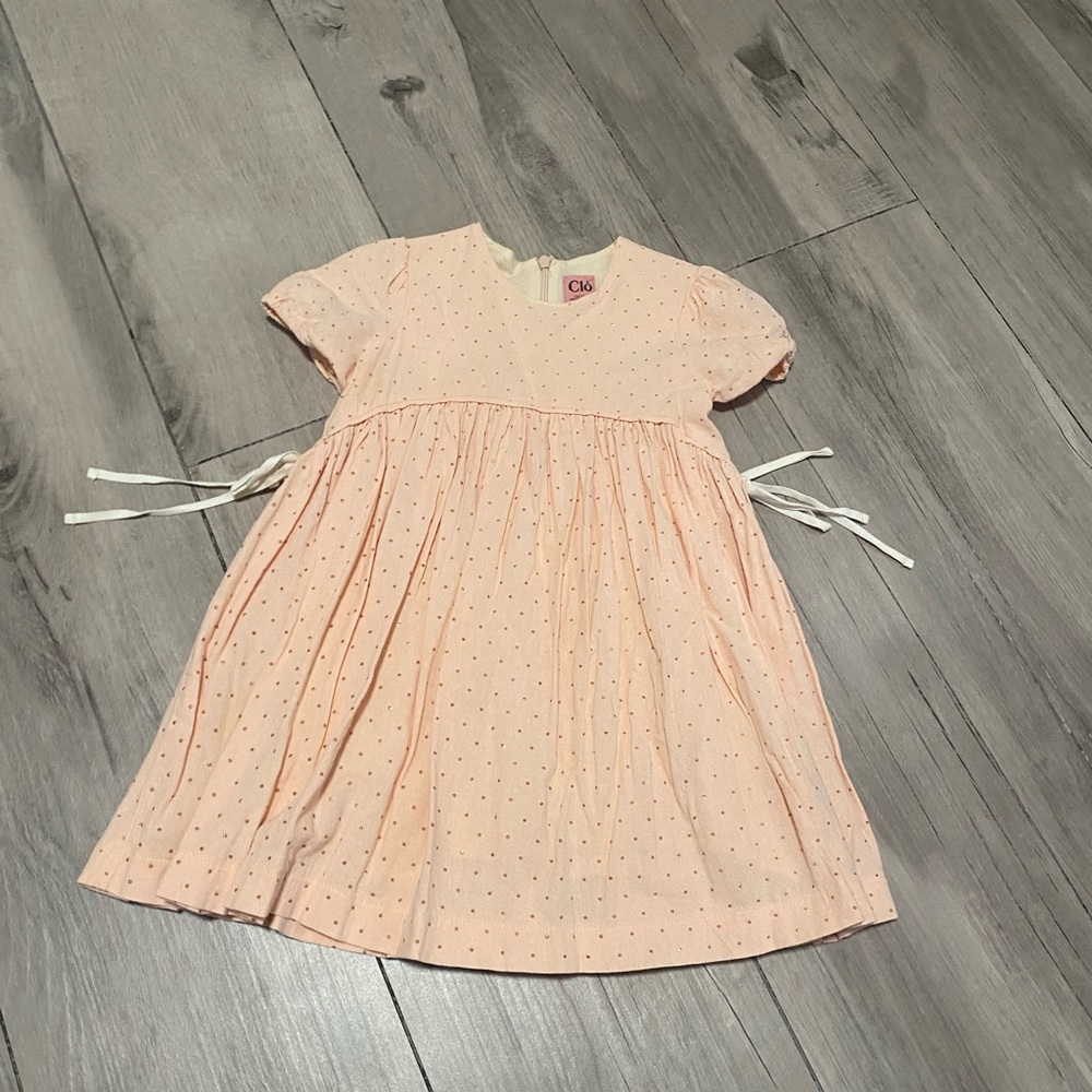 Shiny peach sparkly dotted dress with side tie bows